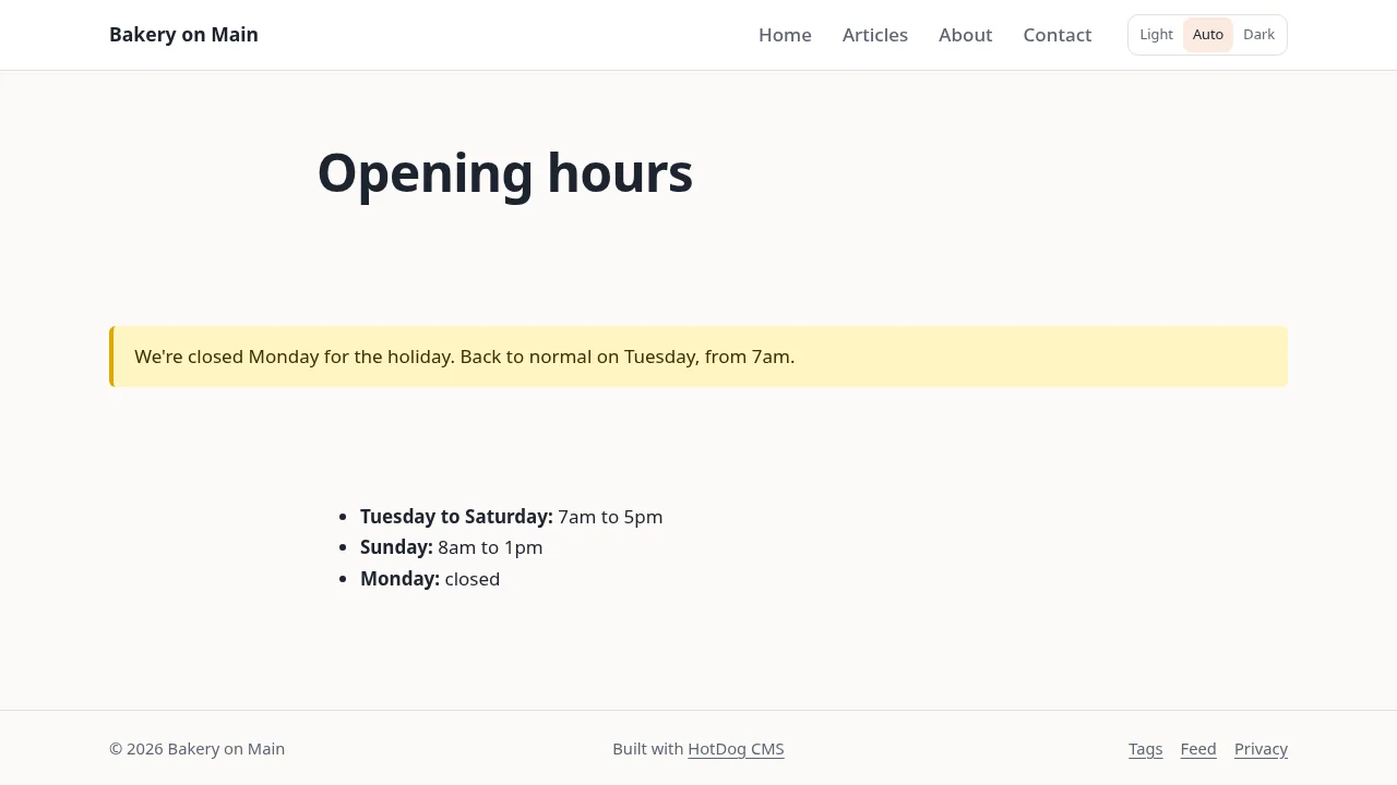 A page called Opening hours, with a yellow notice across it: We're closed Monday for the holiday