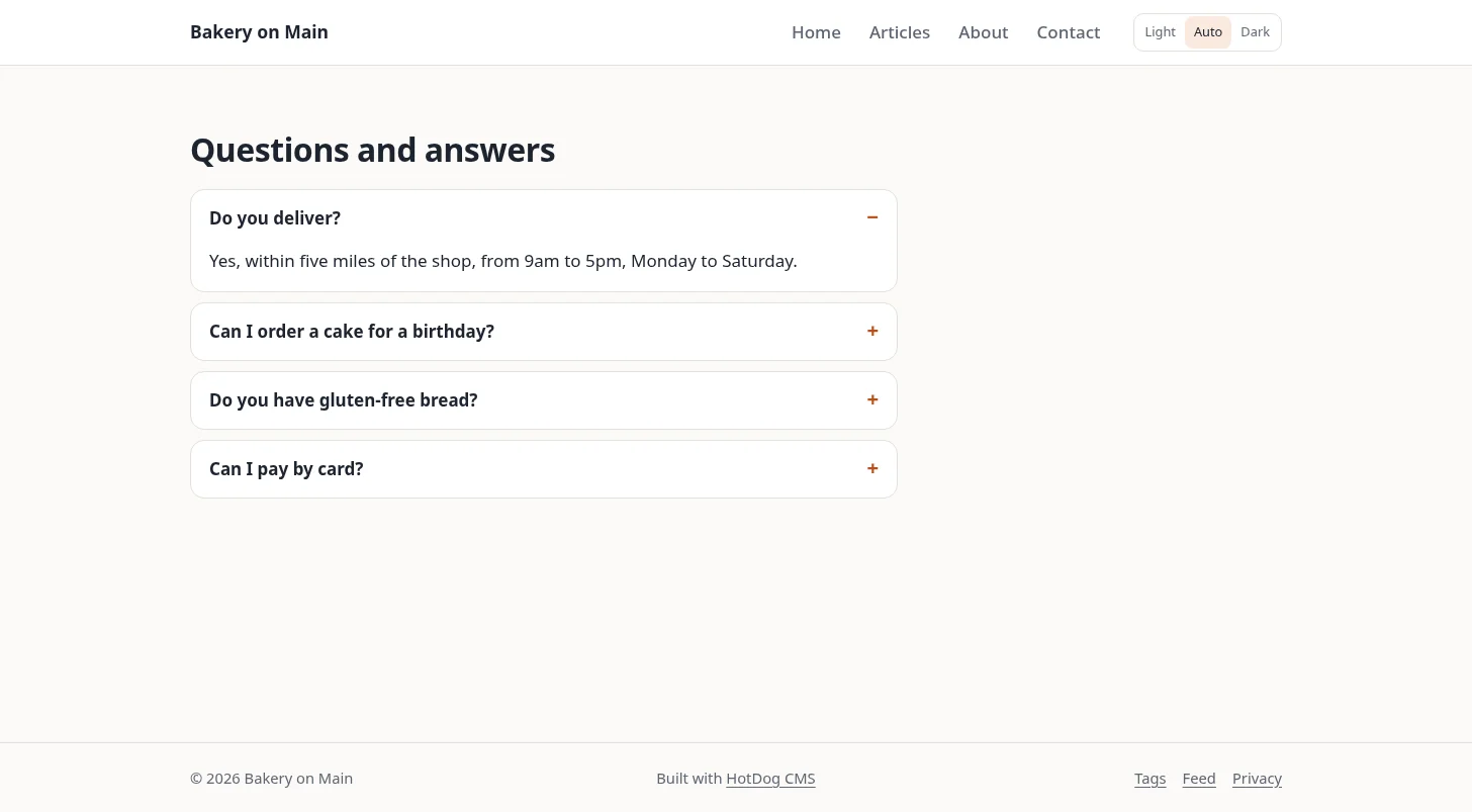 The Questions page: four questions, the first one open to show its answer